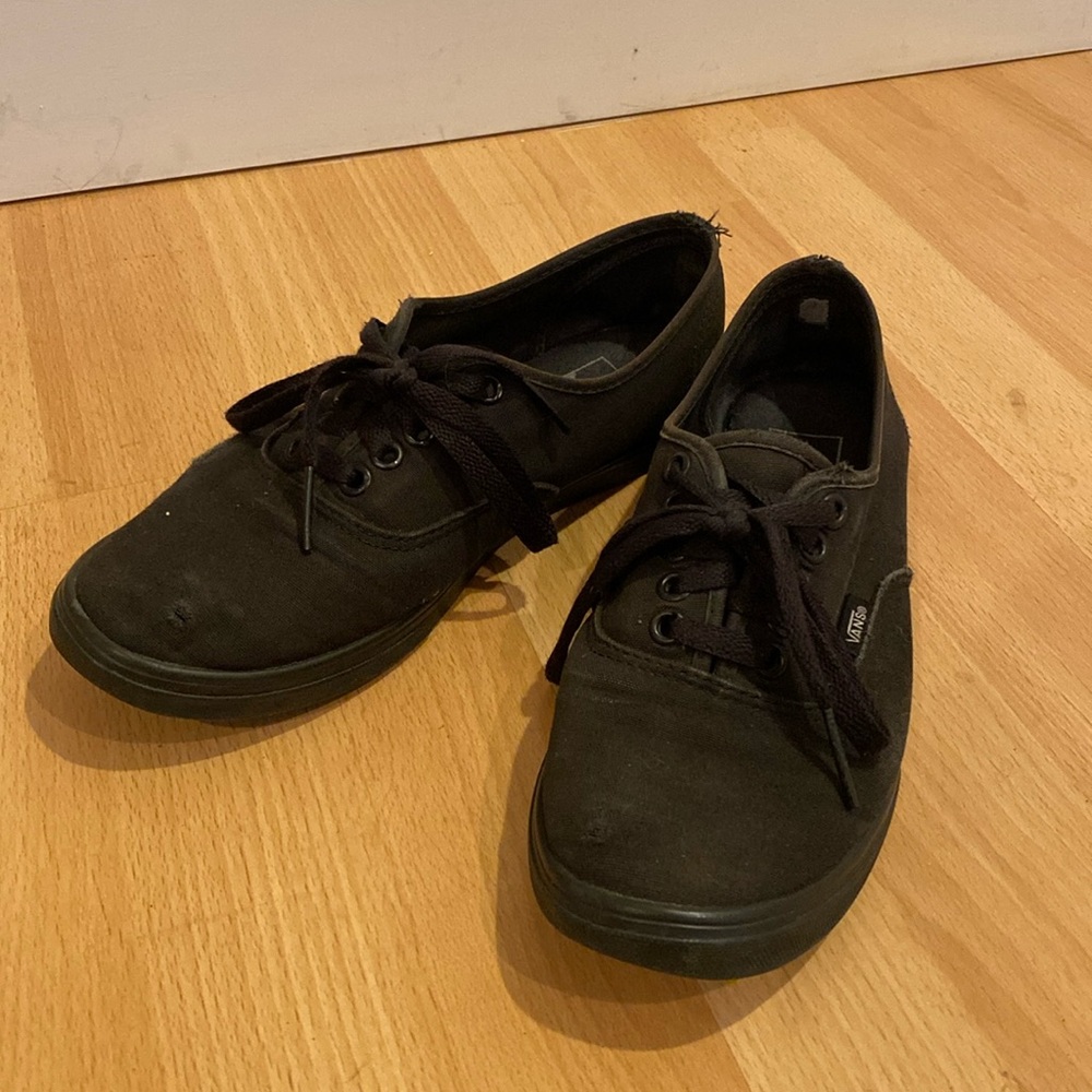 Worn black Vans